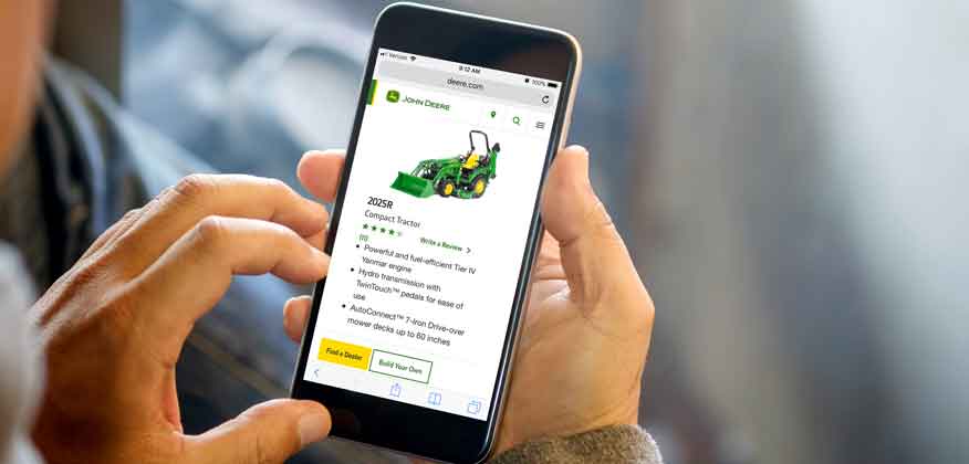 Cell phone with John Deere website on the screen