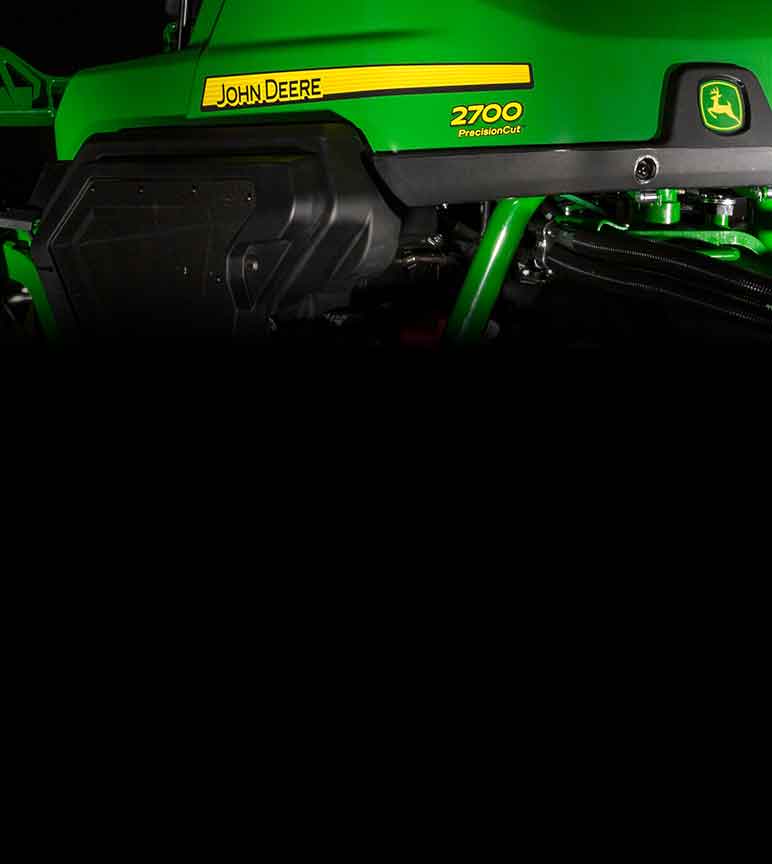 Close up of a John Deere 2700 PrecisionCut with spotlight on it