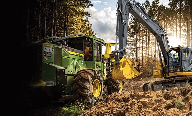 a construction and forestry vehicle in front of a forest