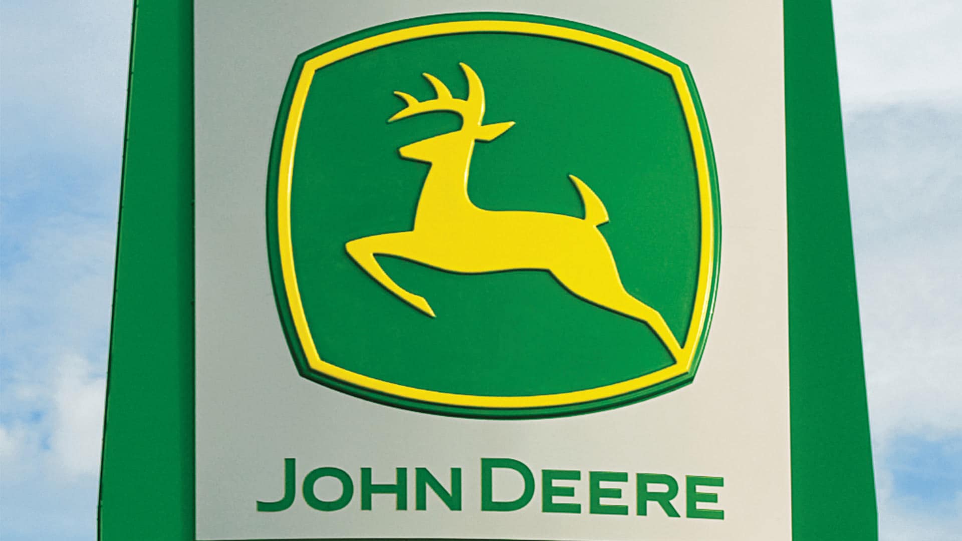 Dealership sign showing John Deere logo