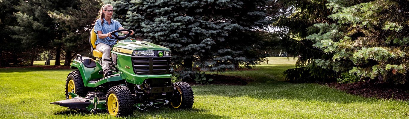 Image of X739 Series Lawn Tractor mowing a yard
