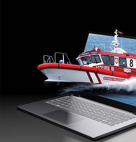 An illustration of a John Deere engine powered ship coming out of a laptop screen into reality.