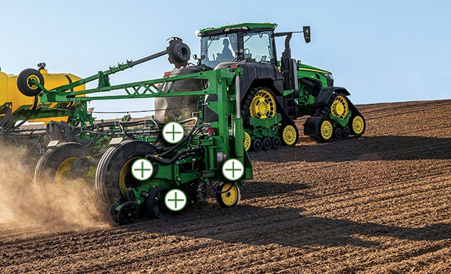 Image of a tractor pulling a planter with Plus Sign indicators showing where upgrades can occur